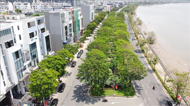 Đoạn phố Trần Quý Kiên dọc theo sông Sài Gòn kiến tạo nhiều cụm dân cư mới ở thành phố Thủ Đức, Thành phố Hồ Chí Minh. Ảnh: Thanh Vũ-TTXVN