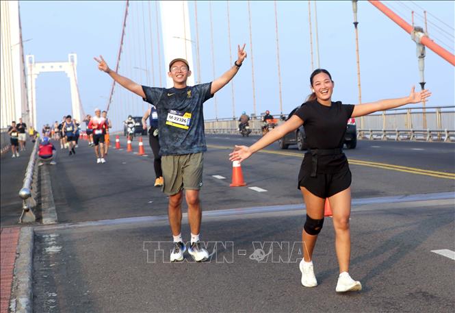 Các vận động viên hào hứng khi được tranh tài Marathon tại Giải. Ảnh: Trần Lê Lâm – TTXVN 