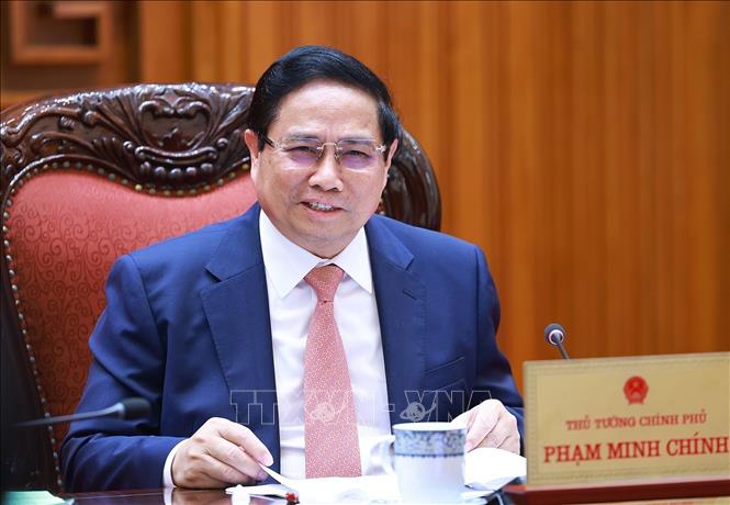 Prime Minister Pham Minh Chinh speaks at the meeting. VNA Photo: Dương Giang