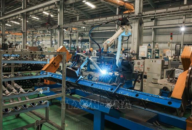 Hệ thống máy hàn tự động tiên tiến tại Nhà máy Cơ khí chính xác và khuôn mẫu THACO, giúp tối ưu hoá quy trình sản xuất, tăng độ chính xác và độ bền của sản phẩm. Ảnh: Hoàng Hiếu - TTXVN