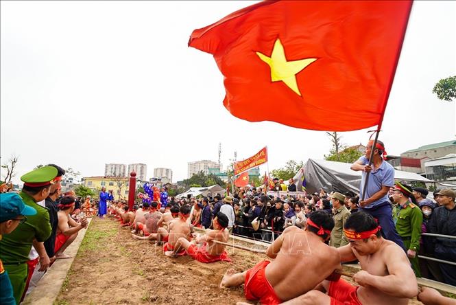 Thi đấu giữa 2 đội. Ảnh: Khánh Hoà - TTXVN