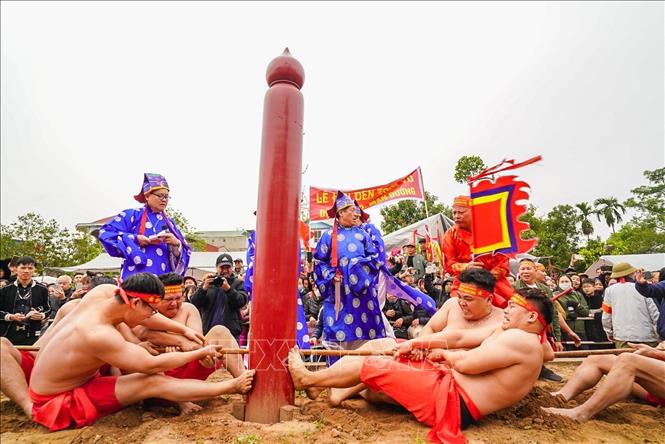 Thi đấu giữa 2 đội. Ảnh: Khánh Hoà - TTXVN