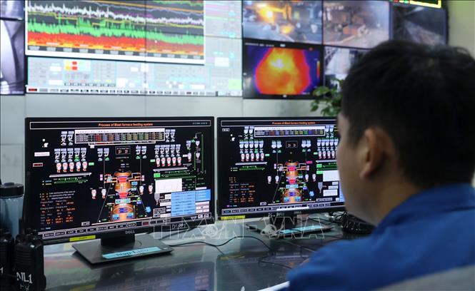 Hoạt động theo dõi sản xuất, điều hành đều được tự động hoá tối đa. Ảnh: Quốc Khánh - TTXVN
