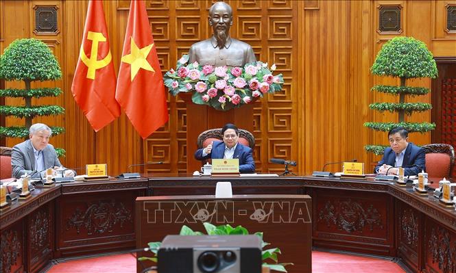 Thủ tướng Phạm Minh Chính chủ trì cuộc họp về mức áp thuế mới của Hoa Kỳ đối với hàng hoá nhập khẩu từ Việt Nam. Ảnh: Dương Giang-TTXVN 
