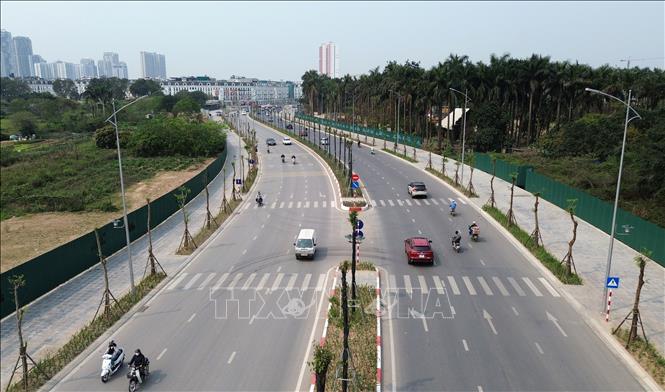 Đường có giải phân cách cứng và 3 làn xe lưu thông. Ảnh: TTXVN