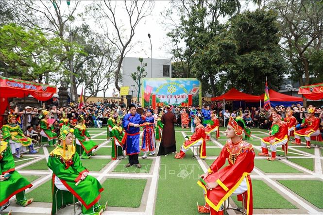 Phần thi cờ người tại Lễ hội Quán Giá. Ảnh: Khánh Hoà - TTXVN
