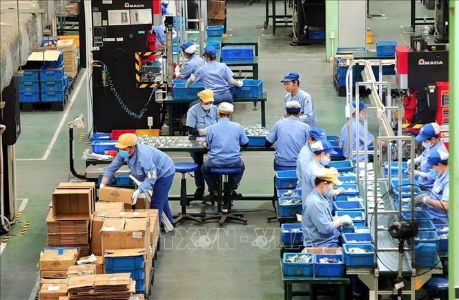 Processing-manufacturing remains a growth driver of the whole economy as the activities rose 9.28% to contribute 2.33 percentage points to the overall growth. VNA Photo: Tuấn Anh 