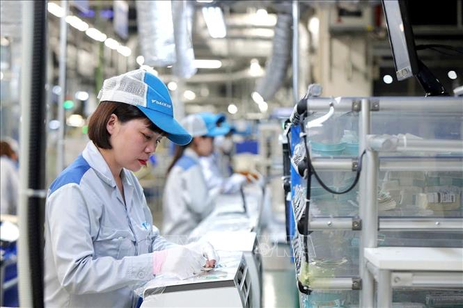 Processing-manufacturing remains a growth driver of the whole economy as the activities rose 9.28% to contribute 2.33 percentage points to the overall growth. VNA Photo: Tuấn Anh 