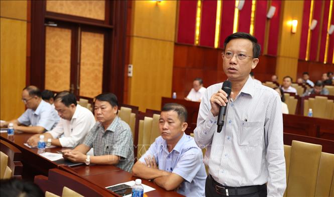 Giám đốc Sở Văn hóa, Thể thao và Du lịch tỉnh Tây Ninh Trần Anh Minh tham gia ý kiến thảo luận tại Hội thảo. Ảnh: Thanh Tân - TTXVN