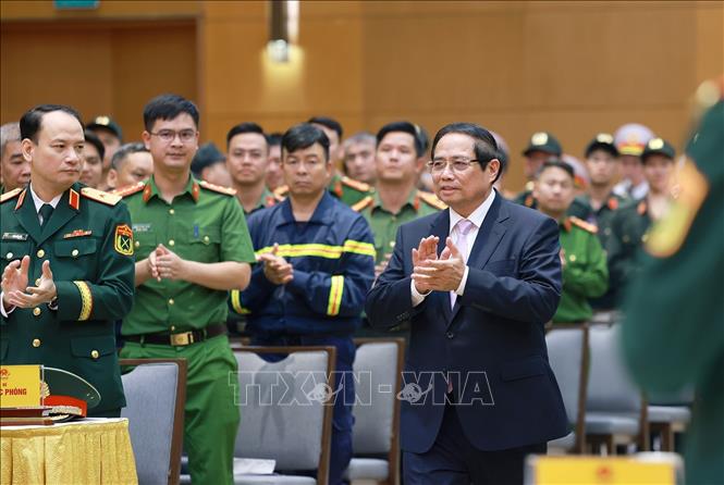 Thủ tướng Phạm Minh Chính dự Lễ tuyên dương lực lượng hỗ trợ Myanmar khắc phục hậu quả động đất. Ảnh: Dương Giang-TTXVN
