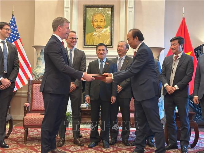 Deputy PM Ho Duc Phoc witnesses the signing ceremony of a MoU on cooperation between Vietnam’s Vietjet and Air Finance of the US. VNA Photo: Ngọc Quang