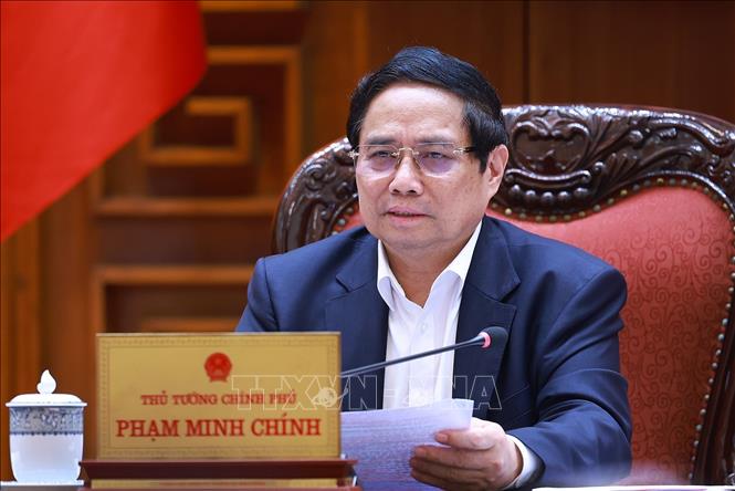 Thủ tướng Phạm Minh Chính chủ trì cuộc họp. Ảnh: Dương Giang-TTXVN 
