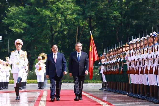 Thủ tướng Chính phủ Phạm Minh Chính chủ trì Lễ đón Thủ tướng Trung Quốc Lý Cường thăm chính thức Việt Nam (13/10/2024). Ảnh: Dương Giang - TTXVN