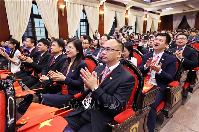 Các đại biểu Đoàn Thanh niên Cộng sản Trung Quốc tham dự buổi lễ. Ảnh: Minh Đức – TTXVN
