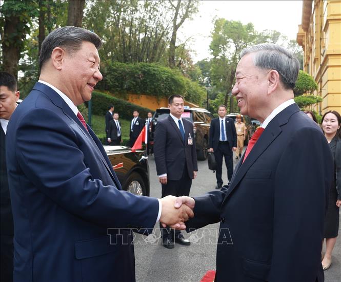 Tổng Bí thư Tô Lâm đón Tổng Bí thư, Chủ tịch nước Trung Quốc Tập Cận Bình. Ảnh: Thống Nhất - TTXVN