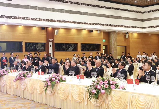 Đại biểu hai nước dự chiêu đãi. Ảnh: Thống Nhất - TTXVN