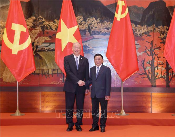 Đồng chí Trần Cẩm Tú, Ủy viên Bộ Chính trị, Thường trực Ban Bí thư và đồng chí Thái Kỳ, Ủy viên Thường vụ Bộ Chính trị, Bí thư Ban Bí thư, Chánh Văn phòng Trung ương Đảng Cộng sản Trung Quốc. Ảnh: Phương Hoa - TTXVN