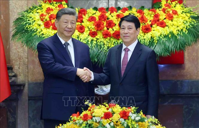 Chủ tịch nước Lương Cường và Tổng Bí thư, Chủ tịch nước Trung Quốc Tập Cận Bình chụp ảnh chung. Ảnh: Lâm Khánh – TTXVN