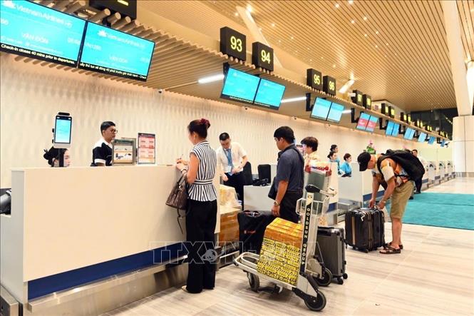 The passengers check in at the T3. VNA/Photo by courtesy