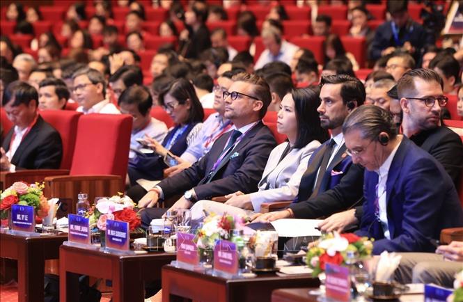 Các đại biểu quốc tế tham dự diễn đàn. Ảnh: Tuấn Anh - TTXVN 