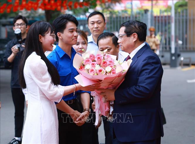 Thủ tướng Phạm Minh Chính đến dự Lễ phát động Phong trào “Cả nước thi đua đổi mới sáng tạo và chuyển đổi số”. Ảnh: Dương Giang-TTXVN