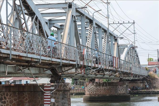 Cầu Rạch Cát có chiều dài 129 m, là cầu sắt nối phường Trung Dũng và phường Hiệp Hoà (thành phố Biên Hoà), hiện phục vụ cho tuyến đường sắt Bắc - Nam và xe 2 bánh lưu thông. Ảnh: Hoàng Hiếu - TTXVN
