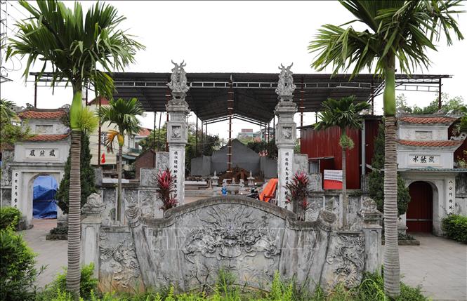 Đình Tình Quang đang được trùng tu. Ảnh: Thành Phương-TTXVN