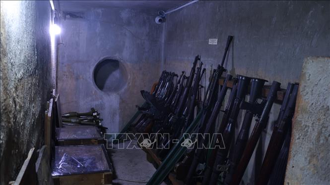 Căn hầm có chiều dài 8m, chiều rộng 2m, chiều sâu 2,5m là căn hầm lớn nhất và chứa nhiều vũ khí nhất của Biệt động Sài Gòn. Ảnh: Hữu Duyên - TTXVN