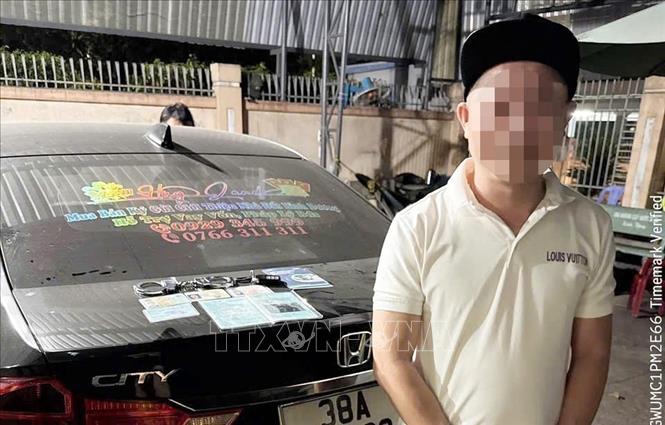 Đối tượng vi phạm tại cơ quan chức năng. Ảnh: TTXVN phát