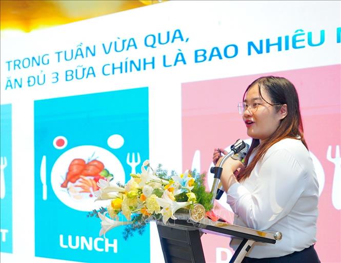 Đại diện Công ty Cổ phần sữa Việt Nam (Vinamilk) tham luận tại hội thảo. Ảnh: Thanh Tùng - TTXVN