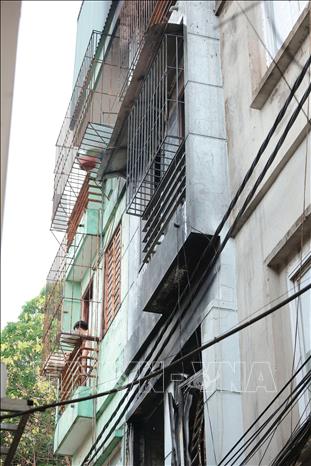Vụ cháy tại ngôi nhà 3 tầng ở số 87a ngách 99/110/85 Định Công Hạ (Hoàng Mai, Hà Nội) khiến 4 người thương vong. Ảnh: Hoàng Hiếu - TTXVN