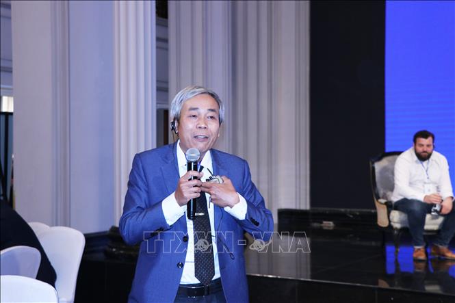 Đại biểu tham luận tại hội thảo. Ảnh: Tường Vi - TTXVN