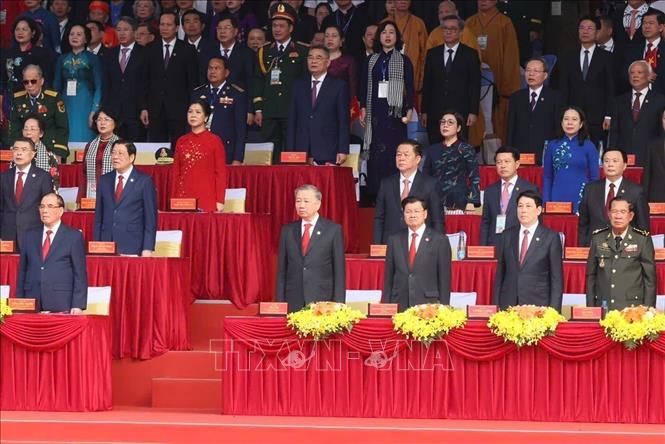 Party, State leaders, domestic and international delegates at the ceremony. VNA Photo