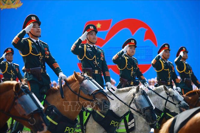 Khối Cảnh sát cơ động kỵ binh diễu qua Lễ đài. Ảnh: TTXVN