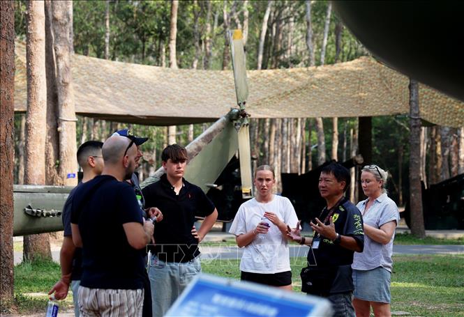 International tourists visit Cu Chi Tunnels relic site. VNA Photo: Hồng Đạt