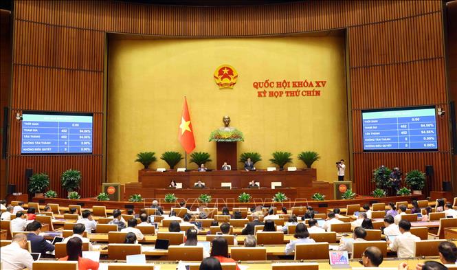 Quốc hội Biểu quyết thông qua Nghị quyết của Quốc hội về việc sửa đổi, bổ sung một số điều của Hiến pháp năm 2013. Ảnh: Phạm Kiên - TTXVN