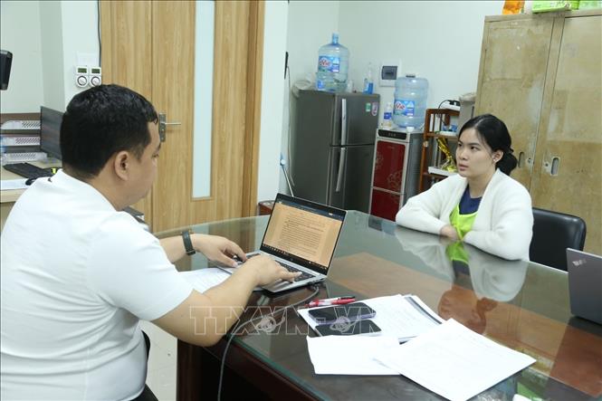 Đối tượng Phạm Trần Phương Anh tại cơ quan công an. Ảnh: Thái Hùng- TTXVN