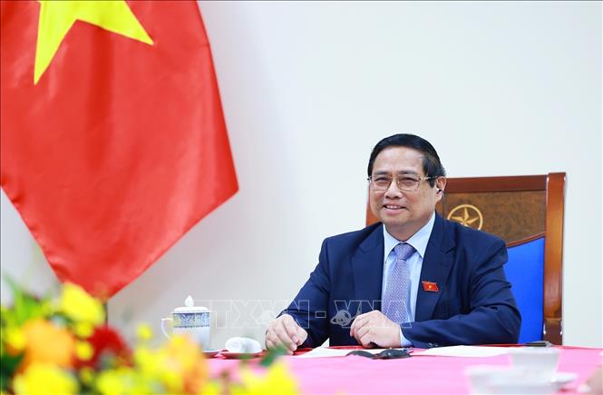 Prime Minister Pham Minh Chinh at the phone conversation. VNA Photo: Dương Giang