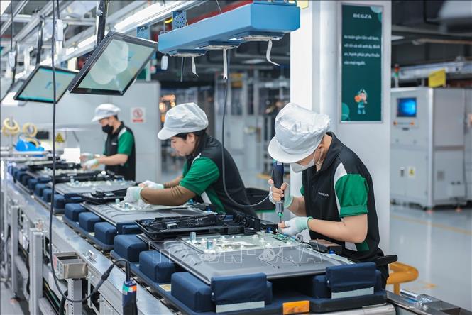 Production at the 100% Taiwanese-invested Regza Vietnam Electronics Co. Ltd in the southern province of Dong Nai. VNA Photo: Hoàng Hiếu