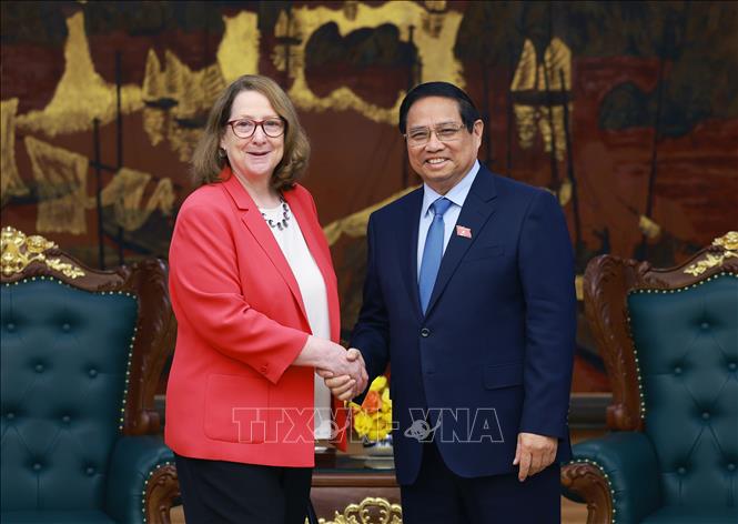 PM Pham Minh Chinh receives USCC Chair Reva Price. VNA Photo: Dương Giang
