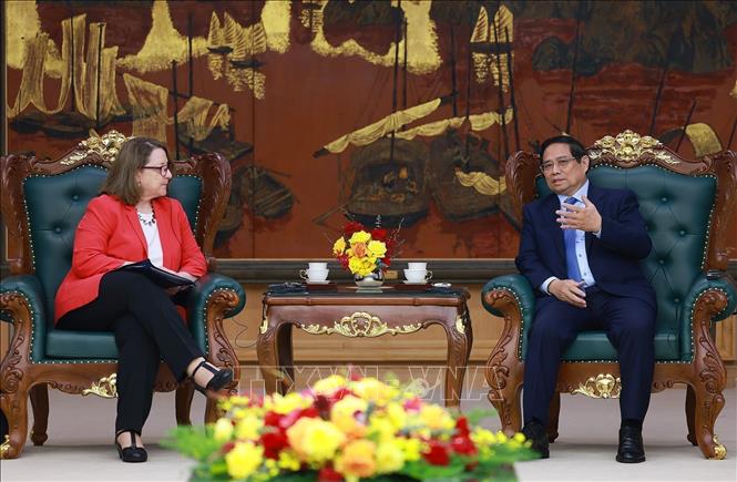 PM Pham Minh Chinh receives USCC Chair Reva Price. VNA Photo: Dương Giang