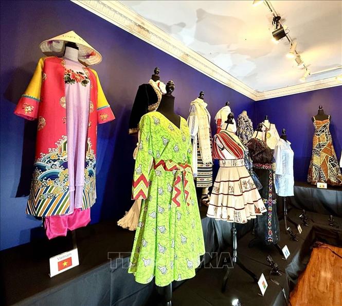 The Nhat Binh costume is on display along with other traditional attire from various countries at the exhibition. VNA/Photo by courtesy