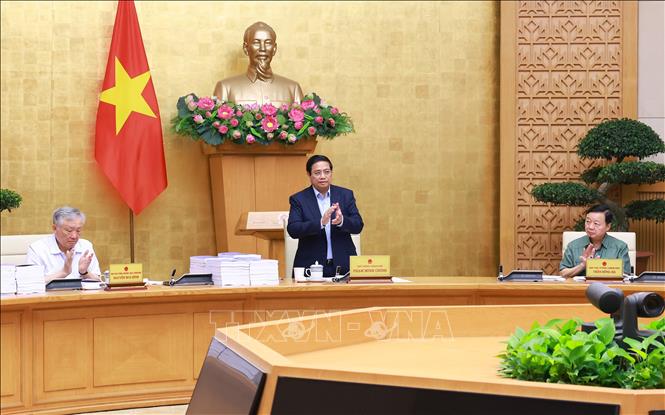 Thủ tướng Phạm Minh Chính chủ trì cuộc họp Chính phủ chuyên đề về việc sắp xếp, tổ chức lại đơn vị hành chính các cấp. Ảnh: Dương Giang-TTXVN

