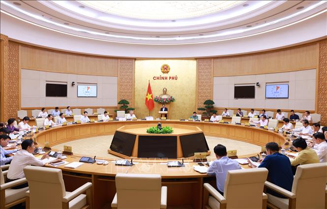 Thủ tướng Phạm Minh Chính chủ trì cuộc họp Chính phủ chuyên đề về việc sắp xếp, tổ chức lại đơn vị hành chính các cấp. Ảnh: Dương Giang-TTXVN
