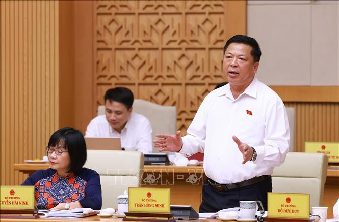 Bộ trưởng Bộ Xây dựng Trần Hồng Minh phát biểu. Ảnh: Dương Giang-TTXVN