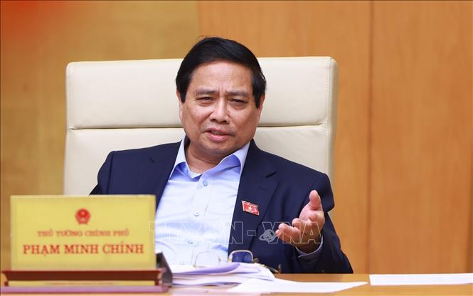 Thủ tướng Phạm Minh Chính chủ trì cuộc họp Chính phủ chuyên đề về việc sắp xếp, tổ chức lại đơn vị hành chính các cấp. Ảnh: Dương Giang-TTXVN
