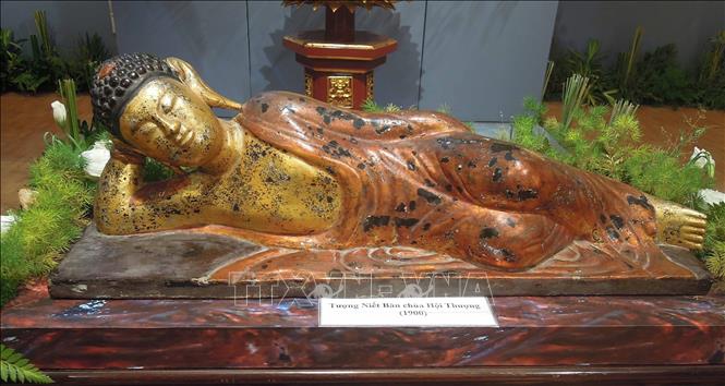 Tượng Phật Niết bàn của Chùa Hội Thượng đậm nét Phật giáo Việt Nam. Ảnh: Kha Phạm – TTXVN.