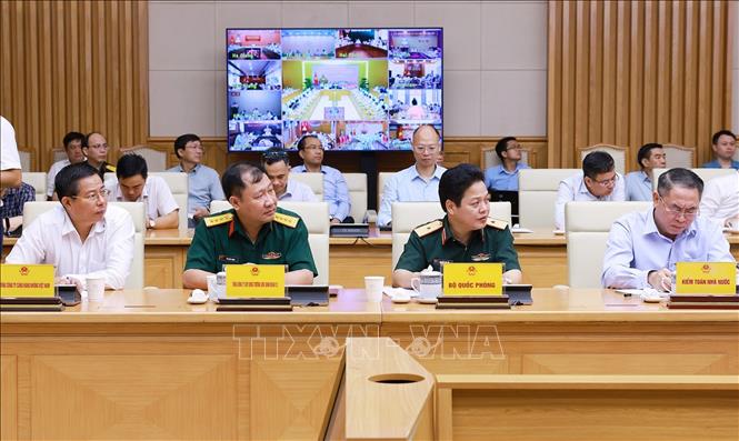 Đại diện các ngành, nhà thầu, ban quản lý dự án tham dự cuộc họp. Ảnh: Dương Giang-TTXVN