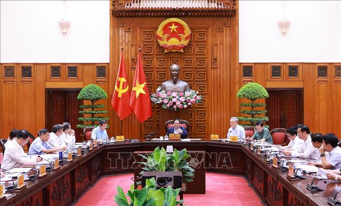 Cuộc họp Thường trực Chính phủ về trung tâm tài chính quốc tế tại Thành phố Hồ Chí Minh và Đà Nẵng. Ảnh: Dương Giang-TTXVN