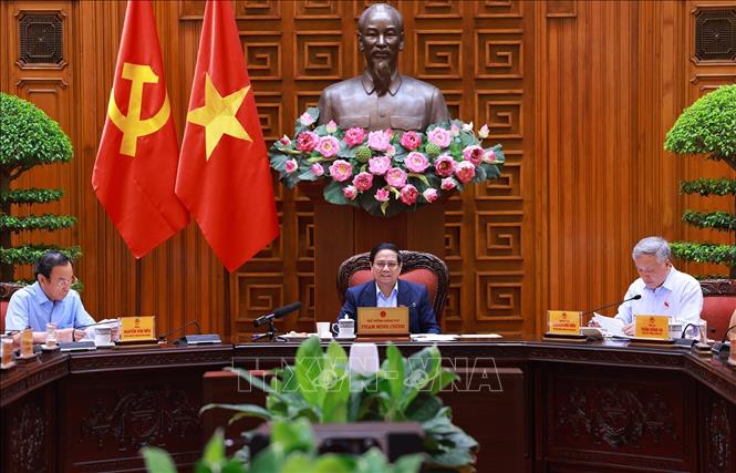 Thủ tướng Phạm Minh Chính chủ trì cuộc họp Thường trực Chính phủ về trung tâm tài chính quốc tế tại Thành phố Hồ Chí Minh và Đà Nẵng. Ảnh: Dương Giang-TTXVN